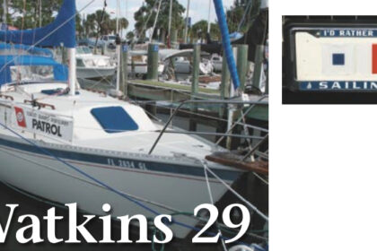 Frank Fitzhenry’s license plate, above, depicts the signal flags “S” and “H,” for Safety Harbor, Florida, the town where he keeps his boat. His Watkins 29 sloop, at left, is one of the few sailboats registered as a U.S. Coast Guard Auxiliary patrol boat. He uses it to teach his boating safety students about aids to navigation, knotwork, and such.