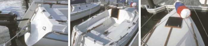 The fixed spade rudder is mounted to the reverse transom, at left, along with a base for mounting an outboard motor bracket. Two thoughtful features: the transom has molded-in swim-ladder steps and a roomy lazarette for stowage. The large cockpit and the narrow companionway hatch, at center. The hatch is offset to allow room below for a wooden compression post beneath the deck-stepped mast. The foredeck, at right, is uncluttered, featuring a solitary mooring cleat and a stout hatch.