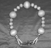 Building on the concept that allows a storm jib to be deployed over a furled headsail, Don has developed parrels that are used to secure a drifter over a furled jib. These wooden or plastic beads roll up and down a furled headsail with little friction or wear on the furled sail.