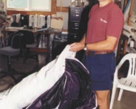 Don Yager shows the advantages of a Chute-Scoop, which has been modified with a wire sleeve in the mouth.