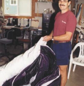 Don Yager shows the advantages of a Chute-Scoop, which has been modified with a wire sleeve in the mouth.
