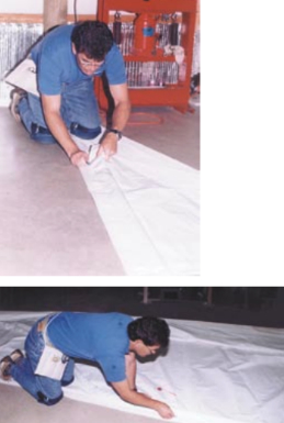 Don re-cuts sails, at left and above, for customers whose cruising grounds have changed or who have old, tired sails in need of reshaping.