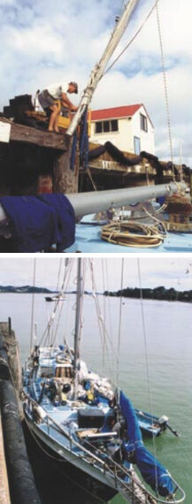 The mizzenmast comes ashore, above. Pulling the masts, below, at Opua Wharf, Bay of Islands, New Zealand.
