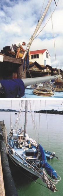 The mizzenmast comes ashore, above. Pulling the masts, below, at Opua Wharf, Bay of Islands, New Zealand.