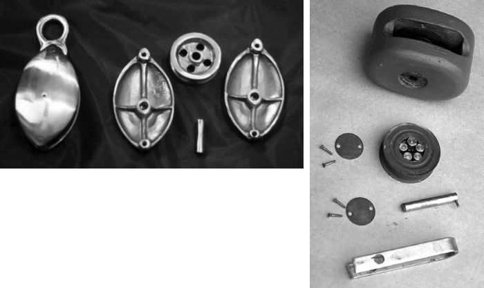 A disassembled Bristol Bronze block, above, and the parts of a wooden cheek block, at right.