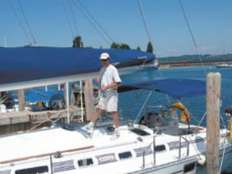 Skip Van Horn, dockmaster for Bay Breeze Yacht Charters, readies a 44-foot Beneteau for a week-long charter on Lake Michigan.