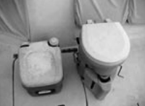 The Air Head, to the right of the Porta Potti, is no wider than the conventional Porta Potti, but it is taller.