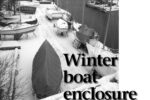 Tom’s boat, Christmas, a 1961 Alden Challenger, in the foreground with her spacious enclosure (and temporary work site). Other boats on the lot show the range of winter tarps . . . the good, the bad, and the ugly.