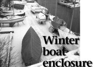 Tom’s boat, Christmas, a 1961 Alden Challenger, in the foreground with her spacious enclosure (and temporary work site). Other boats on the lot show the range of winter tarps . . . the good, the bad, and the ugly.
