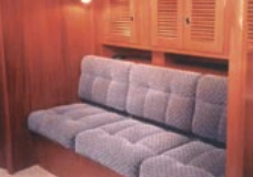 Using a gray-blue with a slight pattern adds a relaxing feel and interest to this settee.