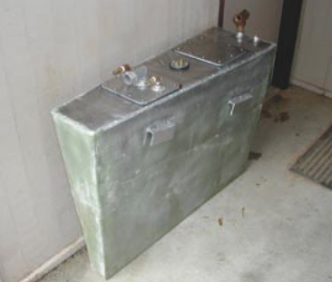 The new tank, built from 3⁄16-inch 5052 aluminum alloy, was intended to be stronger than the original 0.090-inch aluminum fabrication. The cost, including a center vertical baffle, clean-out plates for each compartment, and a number of fittings, was a reasonable $485.