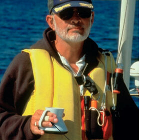 Picture of Jerry Powlas with a barked knuckle