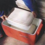 Rubbermaid to the rescue with refillable, refreezable, reusable block ice. And once you own the plastic tubs, the price of ice is nice.