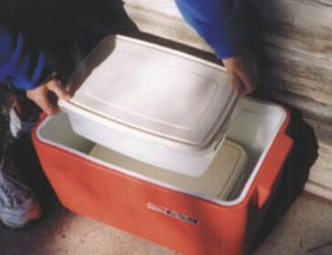 Rubbermaid to the rescue with refillable, refreezable, reusable block ice. And once you own the plastic tubs, the price of ice is nice.