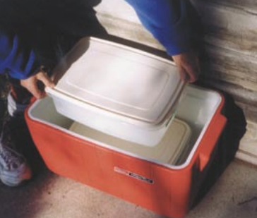Rubbermaid to the rescue with refillable, refreezable, reusable block ice. And once you own the plastic tubs, the price of ice is nice.