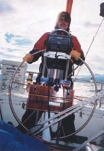 Picture of someone steering a boat