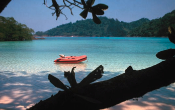 Small is beautiful: a dinghy Jill can carry and an outboard motor she can easily lift.