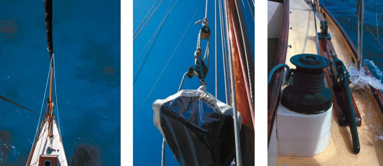 At left, Jill loves her electric anchor winch with one foot switch for “up” and one for “down.” She operates it from the foredeck since Cooee has complications of bowsprit rigging and a long uphill run between the winch and the bow roller. Center, Jill uses the same arrangement of blocks on the bosun’s chair and on the mainsheet. She says hauling herself up the mast with this purchase is not difficult. At right, Cooee has two bronze winches for the jib sheets. Bronze Highfield levers simplify the running backstay work.