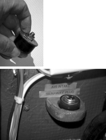 A runaway plug, above left, is cheap insurance. It is kept in a small rack just inside the door of the engine compartment, above. A sign in front of the control panel, below left, reminds author Don Launer that the winter plugs are in the air intake and exhaust.