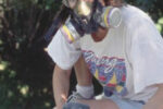 Picture of someone sanding a boat deck