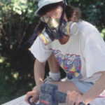 Picture of someone sanding a boat deck