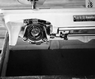 Vertical bobbin assembly.