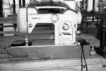 Home sewing machine doing duty outdoors.