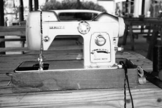 Home sewing machine doing duty outdoors.