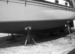 Relieved of about 300 pounds of old bottom paint and repainted, Don’s boat is ready for launching.