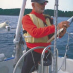 Picture of a man at helm