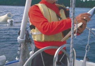 Picture of a man at helm