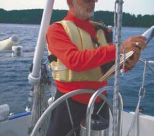 Picture of a man at helm