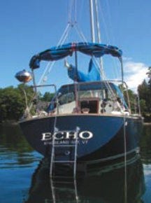 Andrew’s C&C 29 awaits the return of the Wormer family in the dinghy.