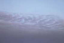 Altocumulus (undulatus) often results from wind shear and resembles ripples on a pond.
