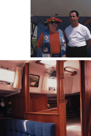 Doug and Carol Kelly are dwarfed by Sapphire as she rests on the hard above. At left, Sapphire’s interior is very open, with panels which slide vertically to permit privacy when needed.