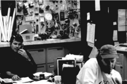 Rob MacLachlan, left, and Steve Kiemele, right, work the phones at South Shore Yachts.
