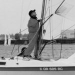 Steve Rander’s Cal 20, Reality Check, started the Portland Cal 20 fleet. Steve bought the boat when it was to be scrapped by a fellow who wanted just the mast. Steve gave him another mast in exchange and went on to start something big in Portland. In the photo at left, Steve’s at the helm, Lynne Hemmert is adjusting the spinnaker, and Todd Johnson is hidden from view.