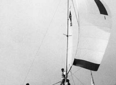 Catalina 22, hull #1, sails in the One of a Kind Regatta on Lake Michigan in 1970. The crew, from left: Rod Mortenson, Beattie Purcell, Lee Buffum, and Herbie Mortenson.