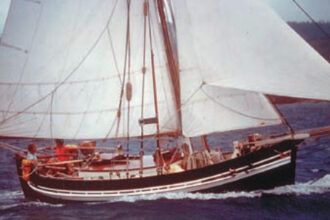 The completed Emigrance under full sail.
