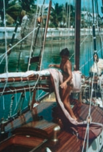 Laurie furls sail aboard Emigrance.