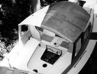 Dabbler’s deckhouse is in place, the engine box removed, the bridge deck lockers installed.