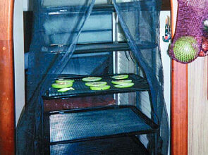 Drying apples in the Food PANtrie aboard Lindsay Christine.