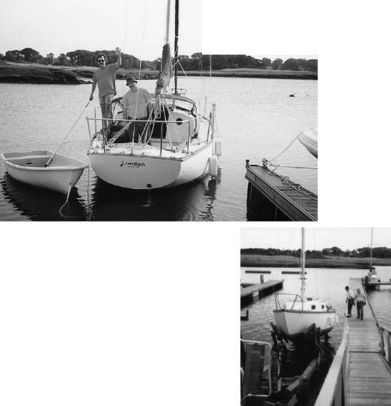 Above, Peter Fifield waves as he and the author begin the trip which will deliver London from Quincy to Buzzard’s Bay. At right, marina workers Dave and Nick at the launch on Town River.