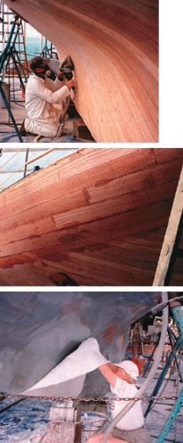 The Kings sanded the surface smooth, at top, before applying the second layer of veneers. These were positioned at 90 degrees to the first layer. Those in the third layer (above the waterline) were positioned horizontally. They laid one layer of fiberglass above the waterline, two below the waterline, three from the turn of the bilge, and four around the forefoot and keel.