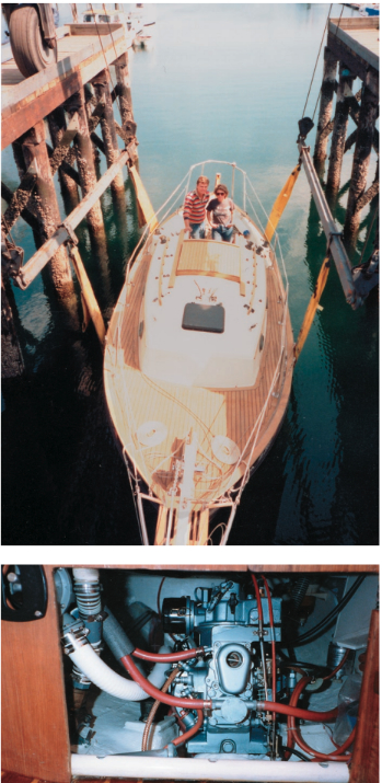 Raven (shown above) is launched in Port Townsend for her return to Alaska. She was outfitted with a BMW 7-hp diesel (shown at left) instead of the 8-hp Yanmar which was standard in the Pacific Seacraft 25. The whole cockpit floor can be removed to provide access to the auxiliary engine. Access from the cabin is minimal.