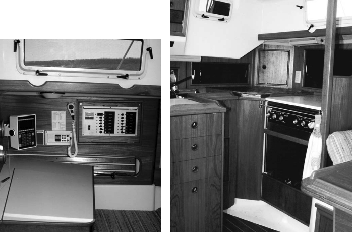 Below, a forward-facing nav station is located near the quarter berth. At right, the galley offers adequate space and an opening port for ventilation.