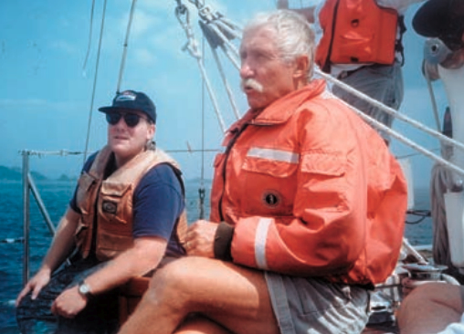 Larry Wheeler, at right, and a student discuss navigation.