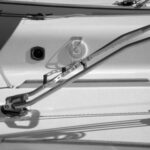 Call them old-fashioned if you will, today’s tillers have taken on a decidedly lightweight and modern look. This one is a New Zealand Lightweight Flyer, a super light tubular tiller with a hiking stick.