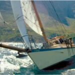 Cooee under sail among the Great Barrier Reef islands.