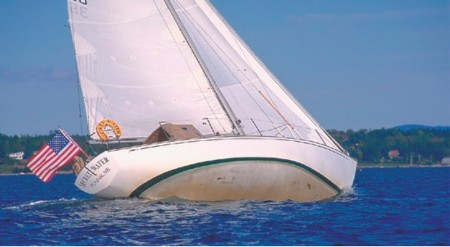 Secret Water sails at some unknown degree of heel. Ted notes that some heeling allows CCA-style boats to pick up waterline length but, the editors who sailed with Art ask, must they show the entire bottom to do so?